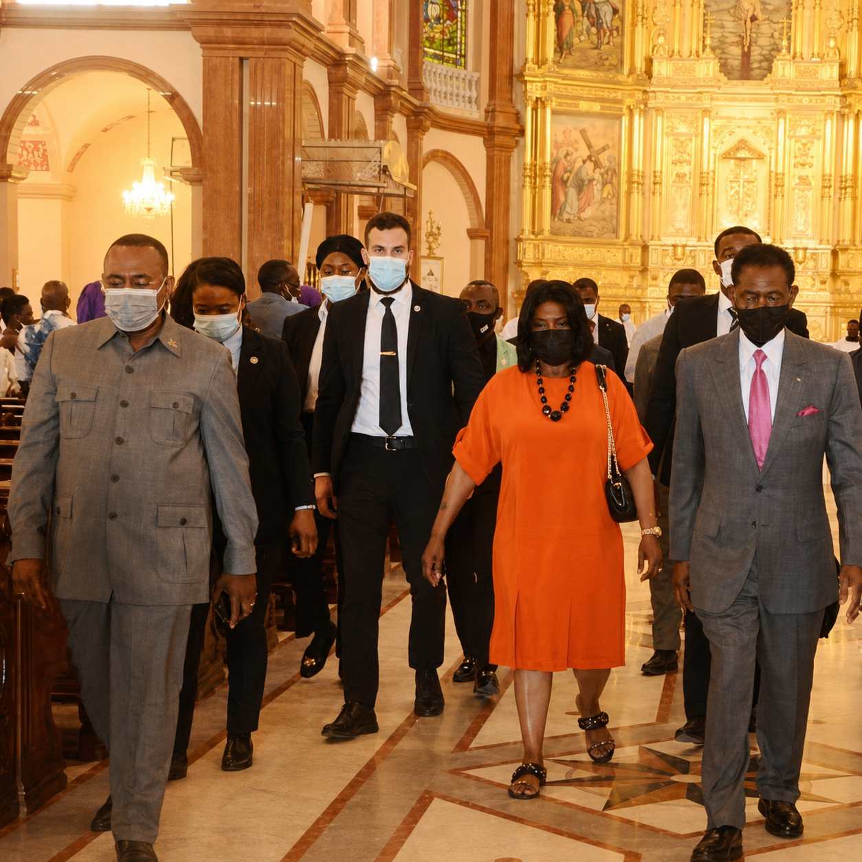 Close-protection detail escorting a head of state during an official visit
