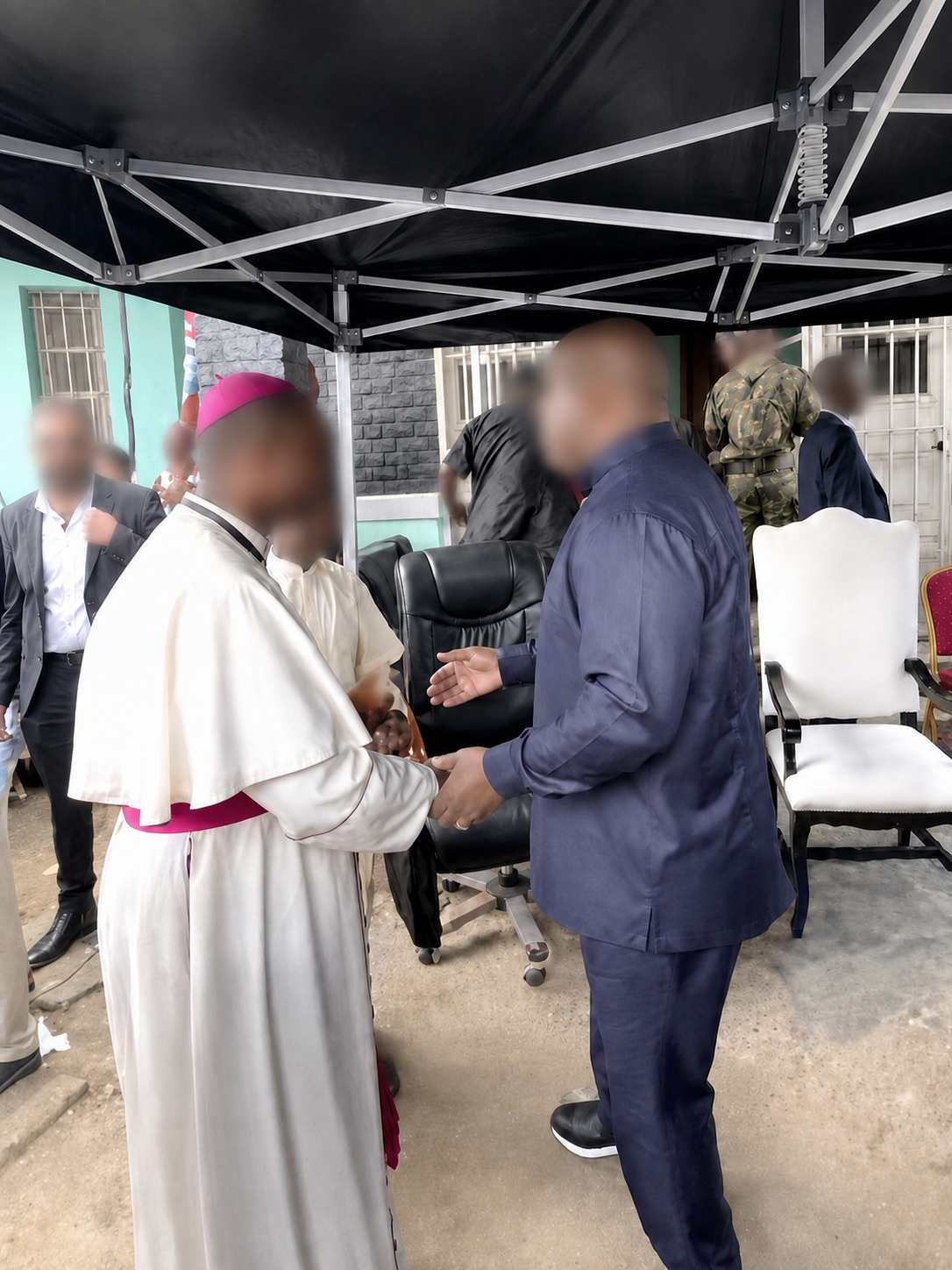 Bodyguard providing close protection for a head of state during an official engagement in Central Africa