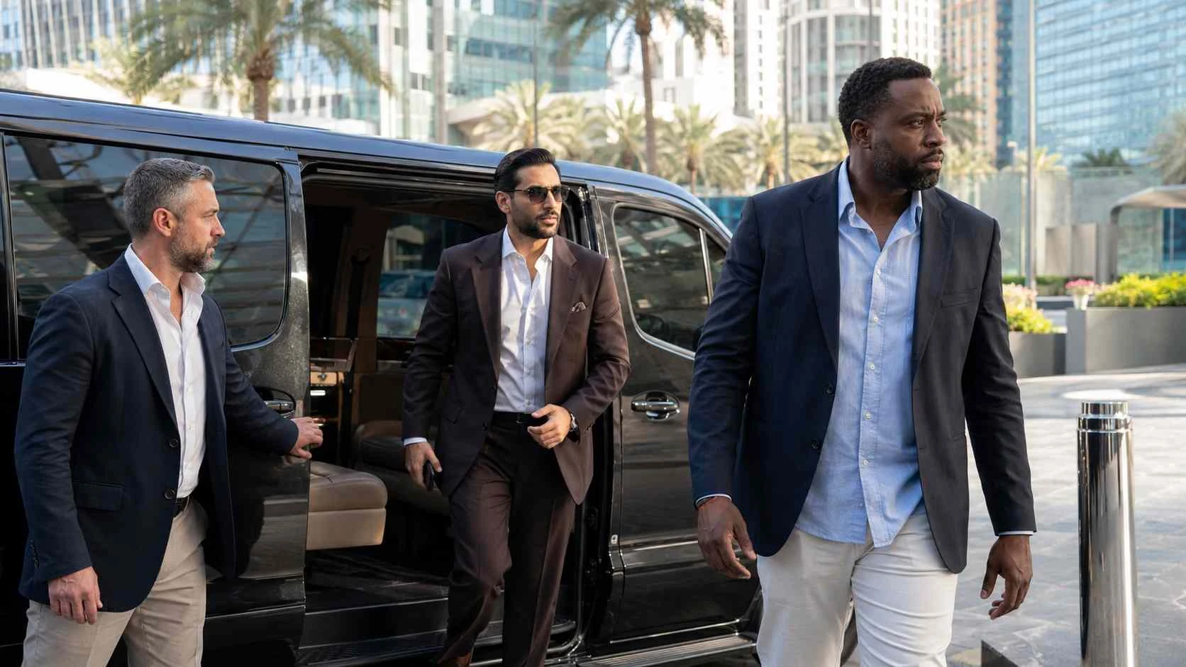 Professional bodyguard team supporting an executive client during a private movement in Dubai