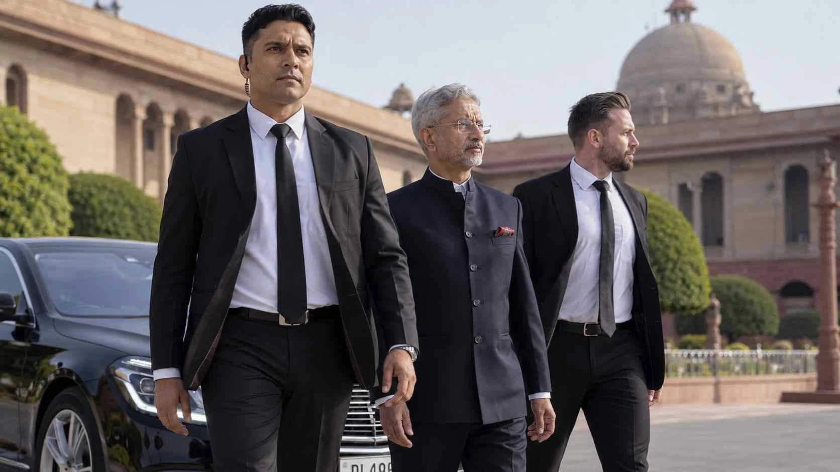 Professional bodyguard team supporting an executive client during travel in New Delhi, India